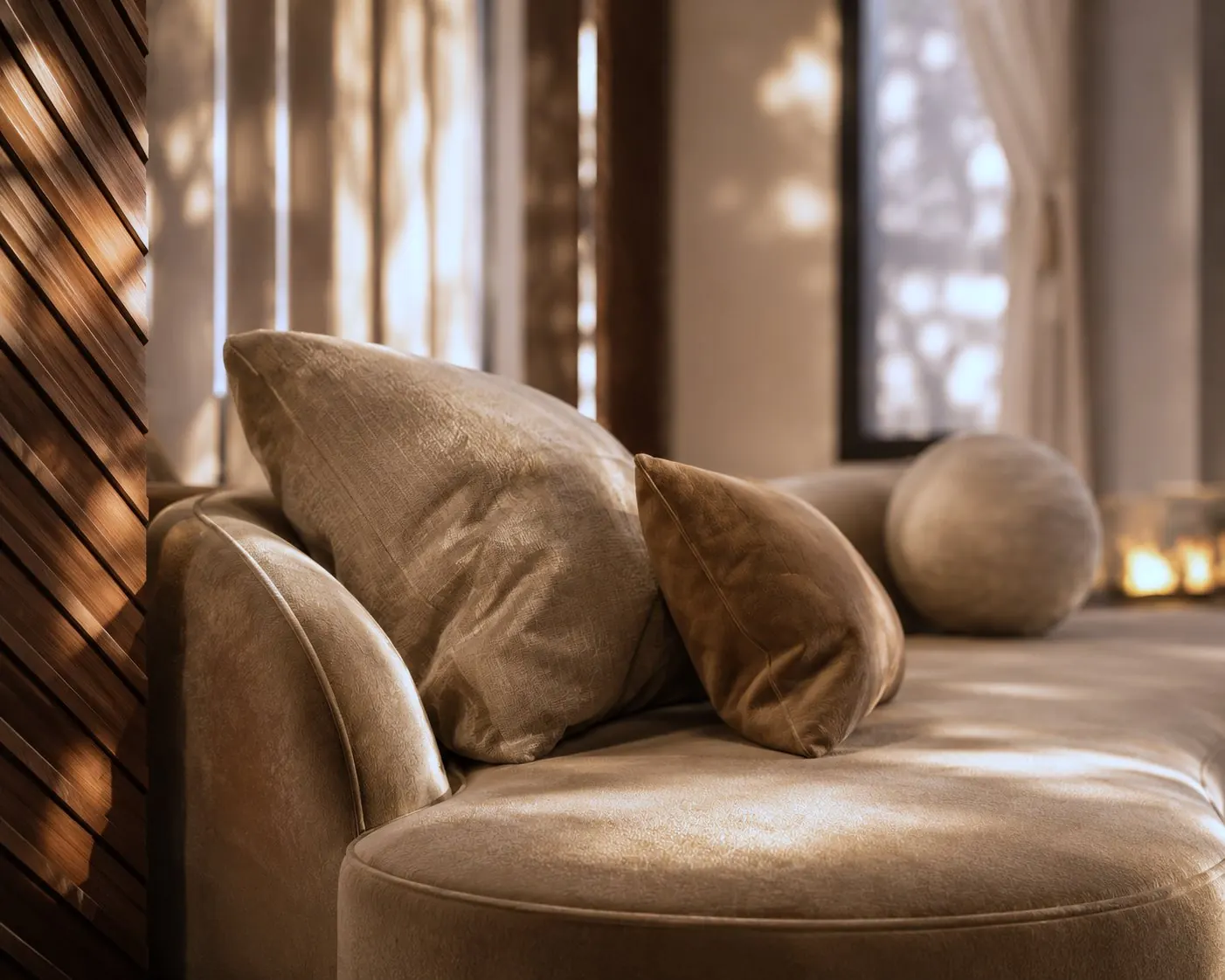 Curved velvet sofa detail beside diagonal wood panel, District One, MBR City